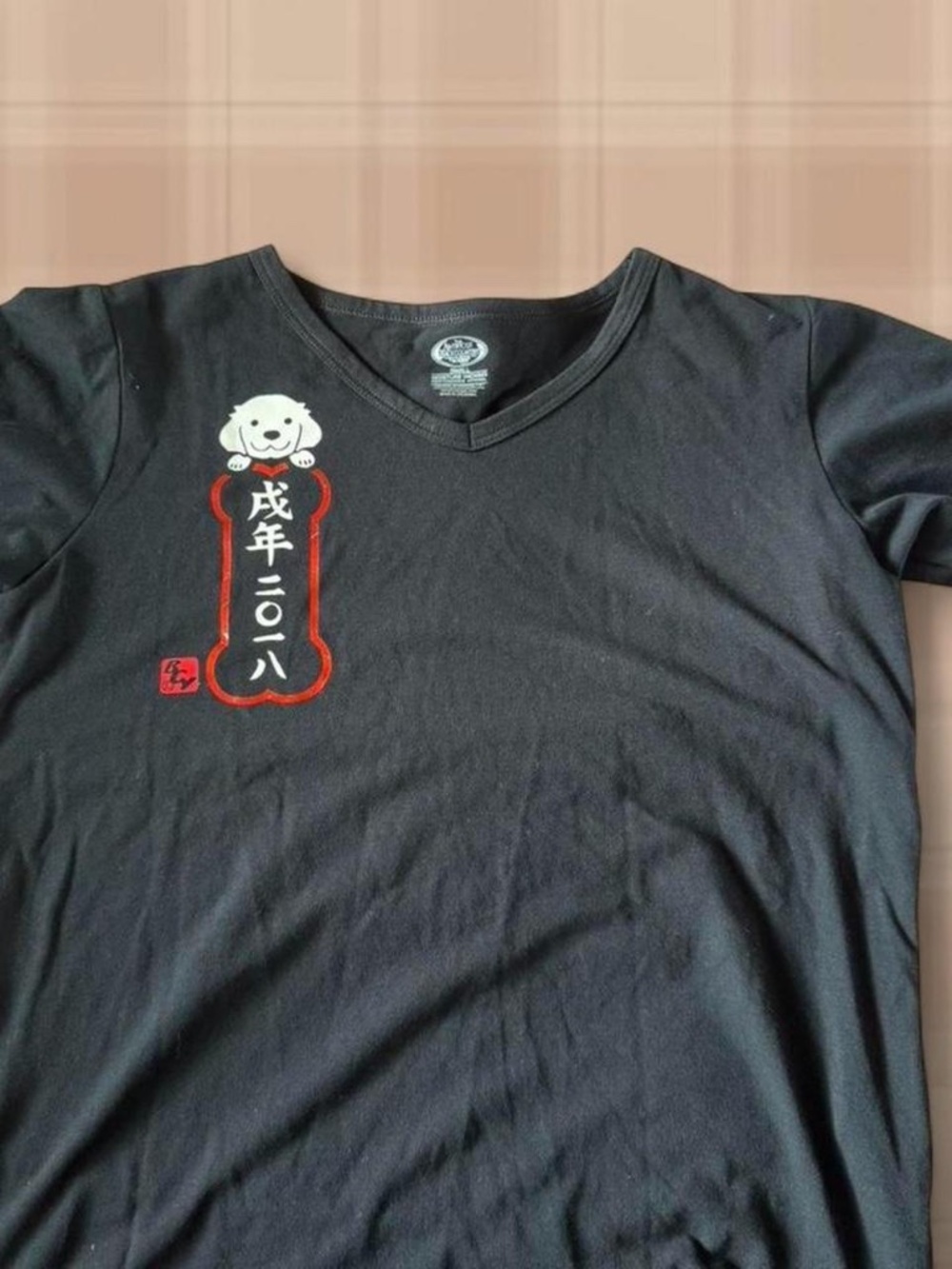 Black dog bone graphic tee
